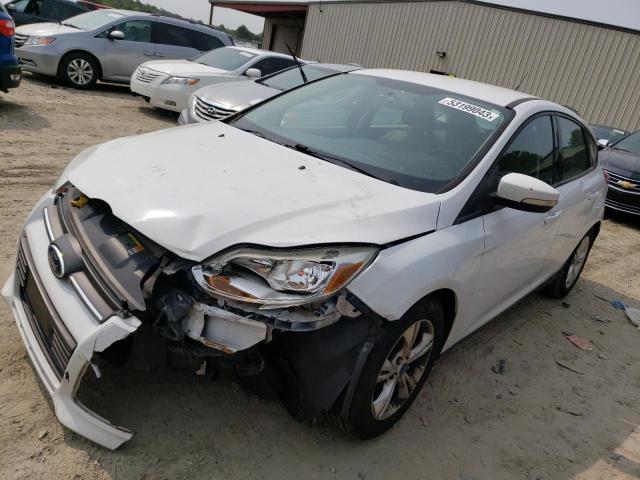 FORD FOCUS SE 2013 with VIN 1FADP3K21DL135754 - Photo from auction