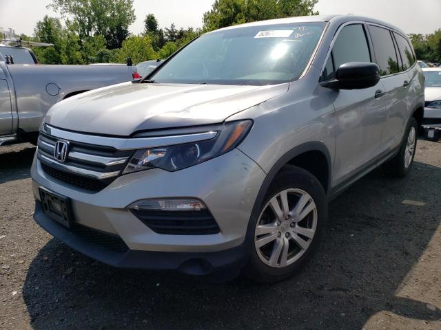 HONDA PILOT LX 2018 with VIN 5FNYF6H12JB021517 - Photo from auction