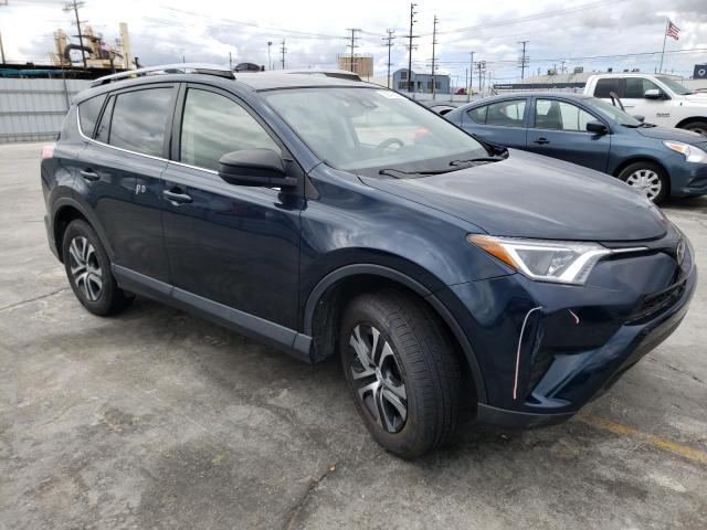 Photo 4 from auction – 2018 TOYOTA RAV4 LE with VIN JTMZFREV7JJ185447