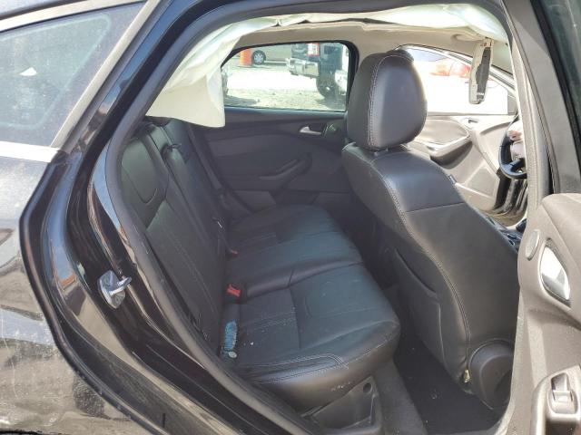 Photo 10 from auction – 2014 FORD FOCUS TITA with VIN 1FADP3N22EL165424