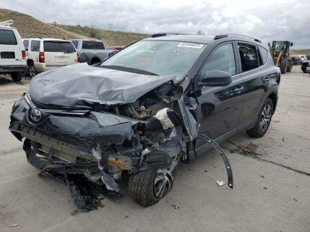 TOYOTA RAV4 LE 2018 with VIN 2T3BFREV0JW790560 - Photo from auction