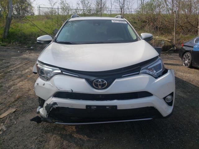 Photo 5 from auction – 2018 TOYOTA RAV4 LIMIT with VIN 2T3DFREV4JW696772