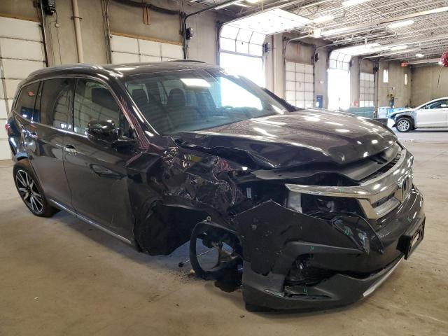 Photo 4 from auction – 2022 HONDA PILOT ELIT with VIN 5FNYF6H07NB026063