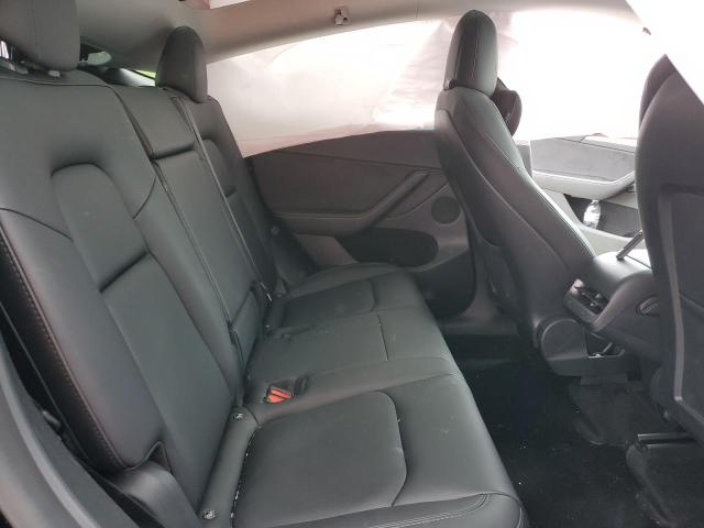 Photo 11 from auction – 2022 TESLA MODEL Y with VIN 7SAYGDEE7NF555162