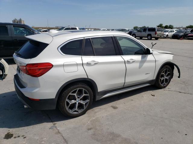 Photo 3 from auction – 2016 BMW X1 XDRIVE2 with VIN WBXHT3C37G5E53391