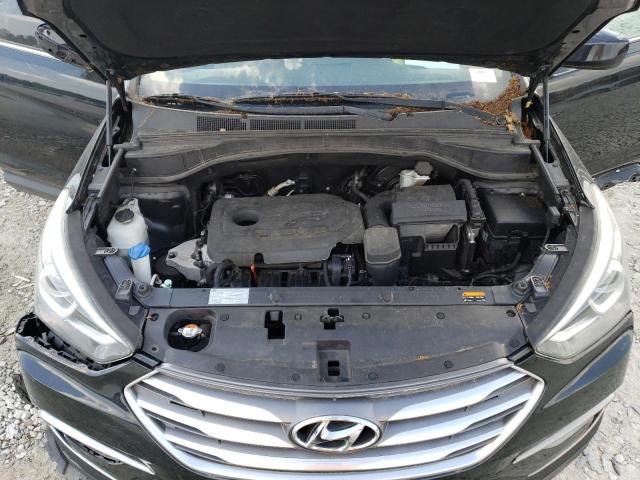 Photo 12 from auction – 2017 HYUNDAI SANTA FE S with VIN 5NMZU3LB0HH015457