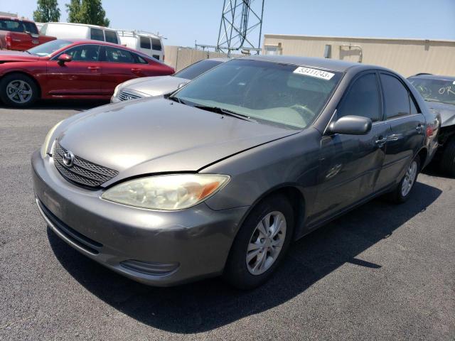 TOYOTA CAMRY LE 2004 with VIN 4T1BF30K24U572515 - Photo from auction