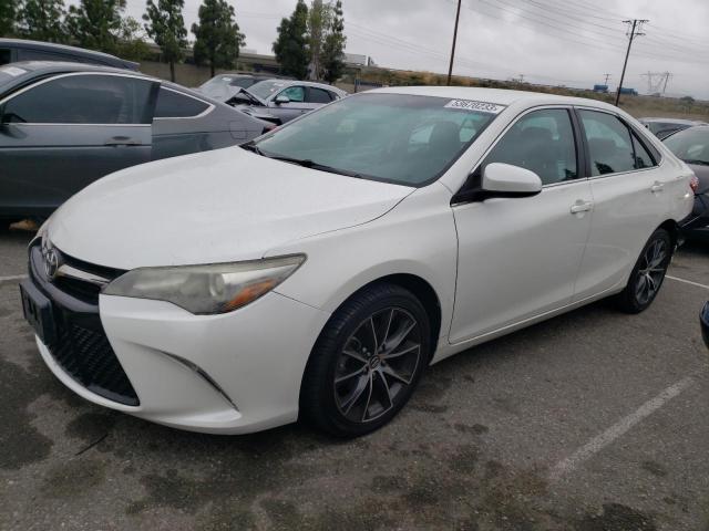 TOYOTA CAMRY LE 2015 with VIN 4T1BF1FK4FU088117 - Photo from auction