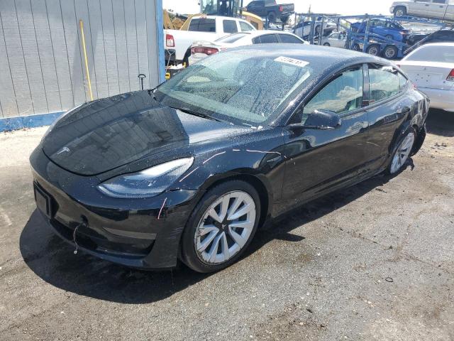 TESLA MODEL 3 2022 with VIN 5YJ3E1EA4NF287048 - Photo from auction