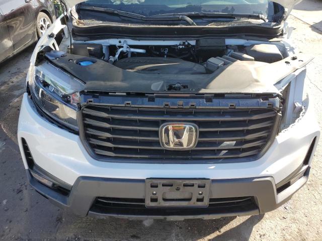 Photo 11 from auction – 2022 HONDA RIDGELINE with VIN 5FPYK3F54NB036923