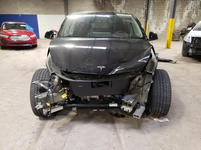 Photo 5 from auction – 2023 TESLA MODEL Y with VIN 7SAYGDEEXPA034209