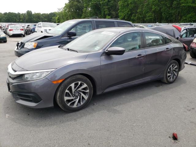 HONDA CIVIC EX 2018 with VIN 2HGFC2F79JH591963 - Photo from auction