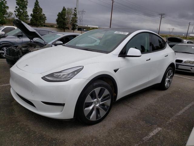 TESLA MODEL Y 2022 with VIN 7SAYGDEE8NF462084 - Photo from auction