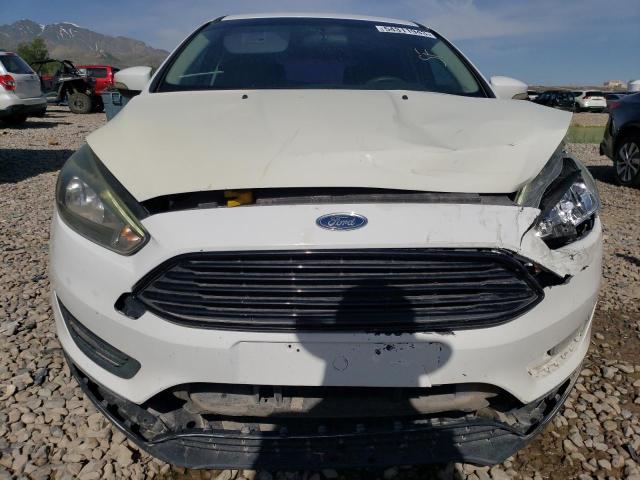 Foto 5 de la subasta – 2016 FORD FOCUS SE con VIN 1FADP3KEXGL275977