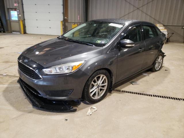 FORD FOCUS 2015 with VIN 1FADP3F22FL209857 - Photo from auction