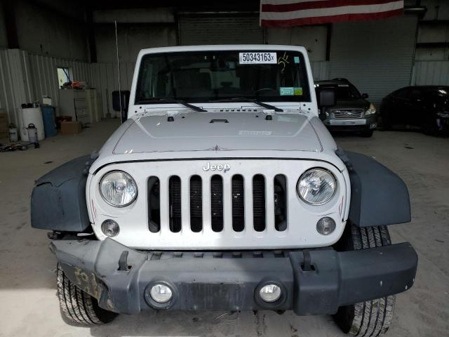 Photo 5 from auction – 2014 JEEP WRANGLER S with VIN 1C4AJWAG6EL269352