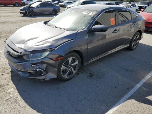 HONDA CIVIC LX 2019 with VIN 19XFC2F60KE021644 - Photo from auction