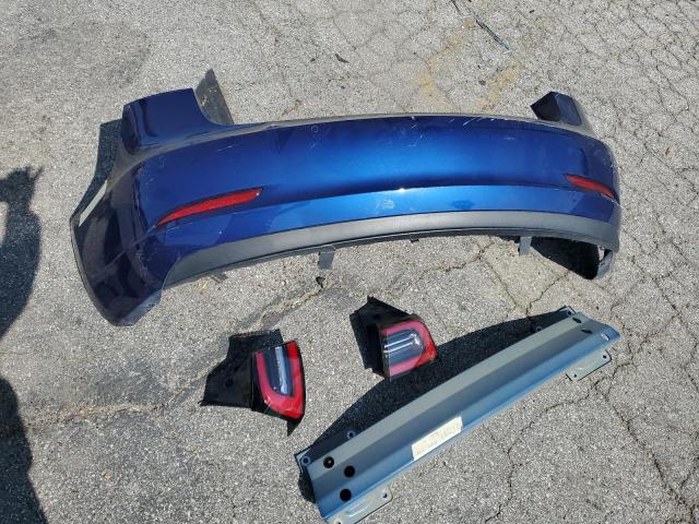 Photo 12 from auction – 2018 TESLA MODEL 3 with VIN 5YJ3E1EA1JF102612