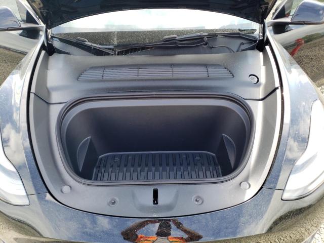 Photo 12 from auction – 2023 TESLA MODEL Y with VIN 7SAYGDEE8PF630423