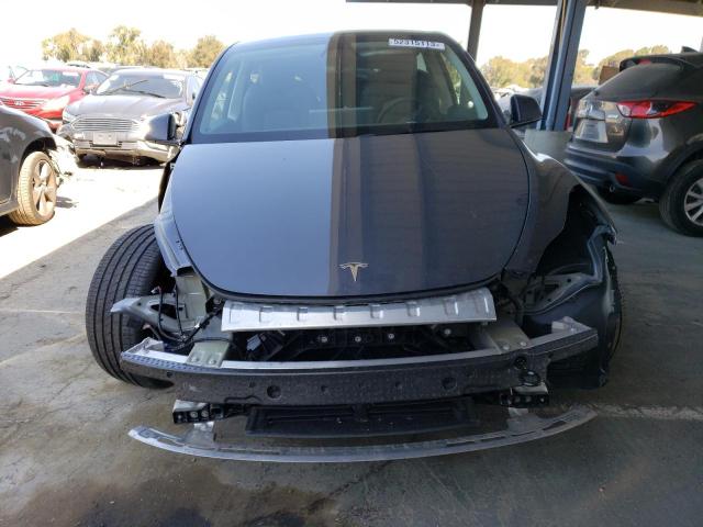 Photo 5 from auction – 2023 TESLA MODEL Y with VIN 7SAYGDEE0PF606228
