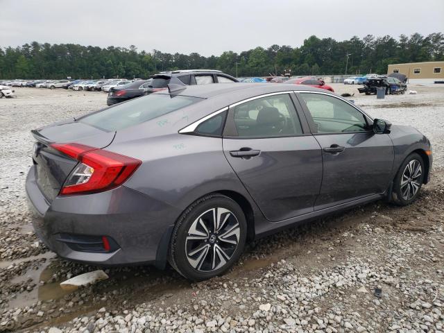 Photo 3 from auction – 2018 HONDA CIVIC EX with VIN JHMFC1F31JX042838
