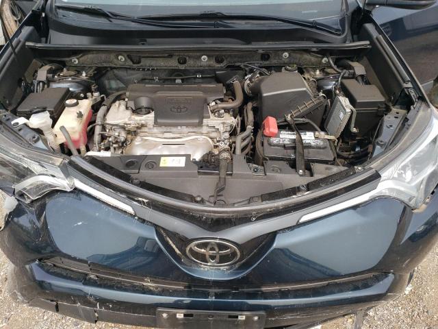 Photo 11 from auction – 2018 TOYOTA RAV4 LE with VIN JTMBFREV0JJ203059