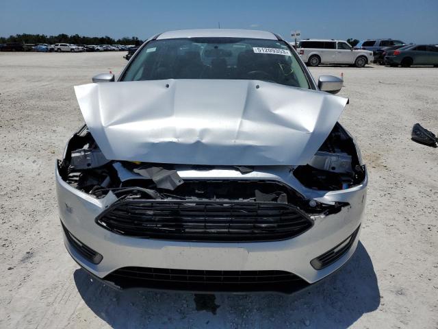 Photo 5 from auction – 2018 FORD FOCUS SE with VIN 1FADP3FE8JL308539