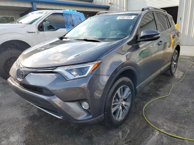 TOYOTA RAV4 XLE 2017 with VIN JTMWFREV0HJ116046 - Photo from auction