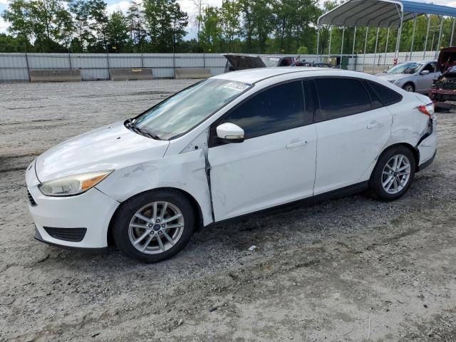 FORD FOCUS SE 2015 with VIN 1FADP3F23FL203825 - Photo from auction