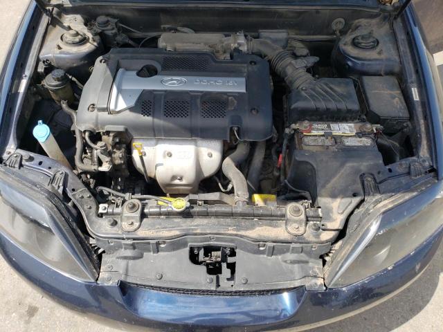 Photo 11 from auction – 2005 HYUNDAI TIBURON with VIN KMHHM65D15U164567