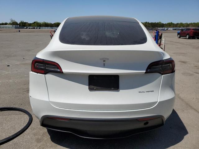 Photo 6 from auction – 2022 TESLA MODEL Y with VIN 7SAYGAEE9NF309762