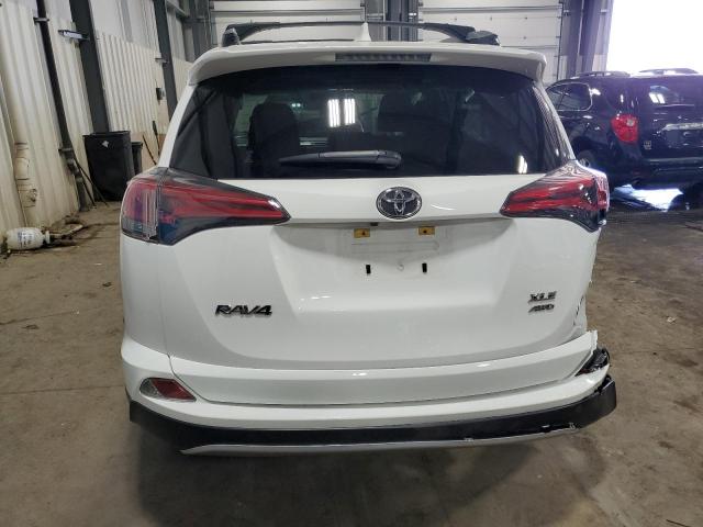 Photo 6 from auction – 2017 TOYOTA RAV4 XLE with VIN JTMRFREVXHJ105407