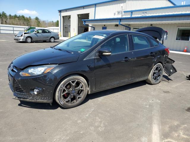 FORD FOCUS SE 2014 with VIN 1FADP3F20EL338288 - Photo from auction