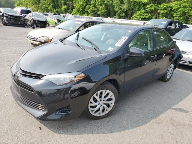 TOYOTA COROLLA L 2018 with VIN 5YFBURHE0JP811256 - Photo from auction