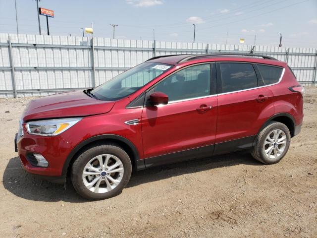 FORD ESCAPE SE 2018 with VIN 1FMCU9GD9JUA23085 - Photo from auction