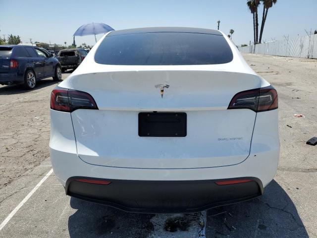 Photo 6 from auction – 2023 TESLA MODEL Y with VIN 7SAYGDEE1PA040206