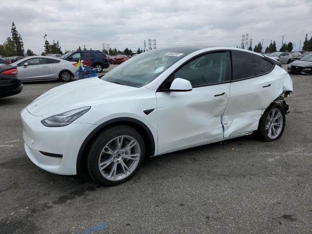 TESLA MODEL Y 2023 with VIN 7SAYGDEE7PA069306 - Photo from auction