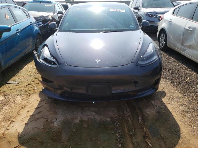 Photo 5 from auction – 2022 TESLA MODEL 3 with VIN 5YJ3E1EB8NF108504