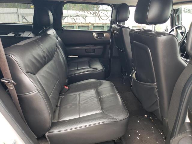 Photo 10 from auction – 2009 HUMMER H2 LUXURY with VIN 5GRGN83219H101976