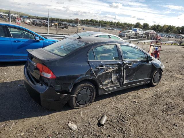 Photo 3 from auction – 2010 HONDA CIVIC HYBR with VIN JHMFA3F20AS006970