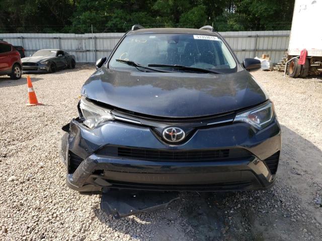 Photo 5 from auction – 2017 TOYOTA RAV4 LE with VIN JTMZFREV8HJ137613