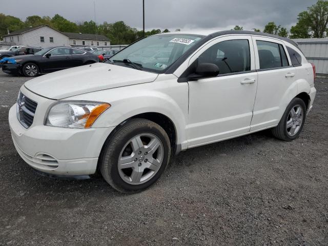 DODGE CALIBER 2009 with VIN 1B3HB48A79D107748 - Photo from auction