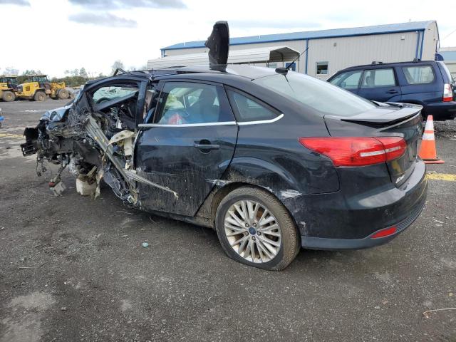 Photo 2 from auction – 2015 FORD FOCUS TITA with VIN 1FADP3J27FL378070
