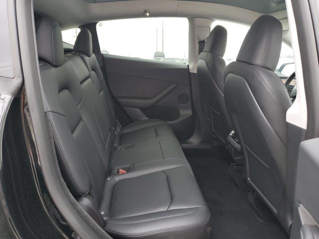 Photo 11 from auction – 2023 TESLA MODEL Y with VIN 7SAYGDEF3PF703089