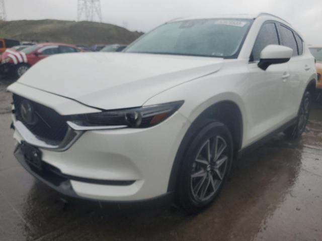 MAZDA CX-5 GRAND 2018 with VIN JM3KFADMXJ1404601 - Photo from auction