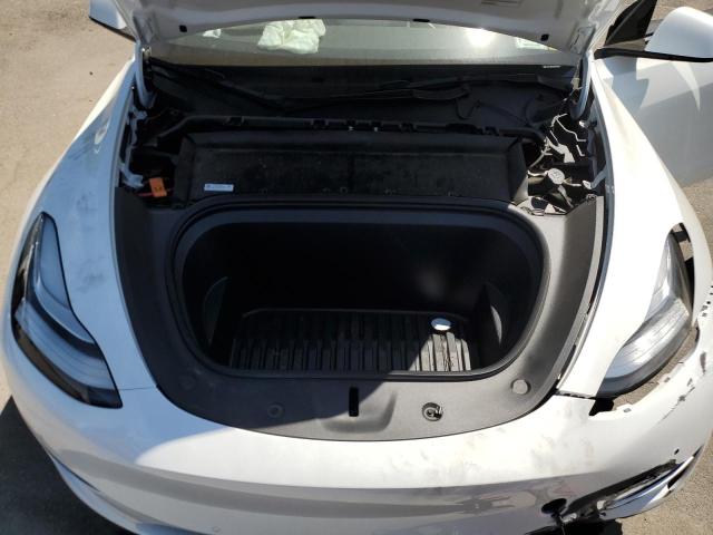 Photo 11 from auction – 2022 TESLA MODEL Y with VIN 7SAYGAEE9NF309762