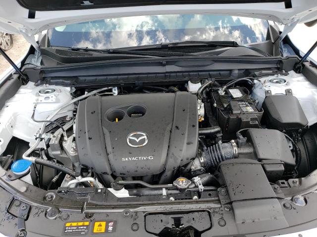 Photo 12 from auction – 2023 MAZDA CX-50 SELE with VIN 7MMVABAM4PN141120