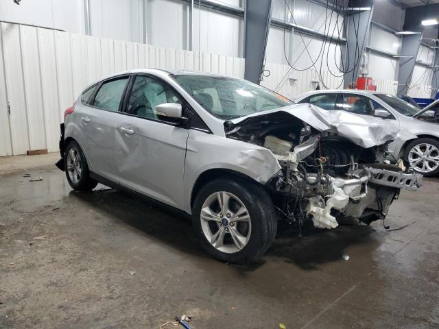 Foto 4 de la subasta – 2014 FORD FOCUS SE con VIN 1FADP3K22EL158476