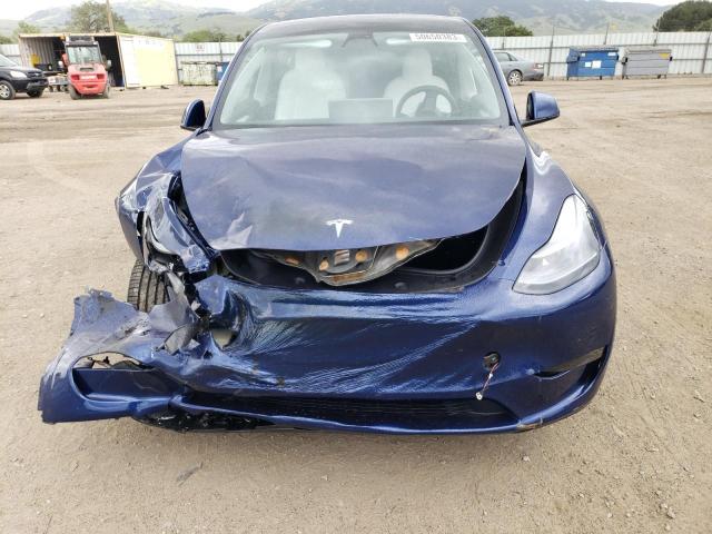 Photo 5 from auction – 2023 TESLA MODEL Y with VIN 7SAYGDEE4PF710253