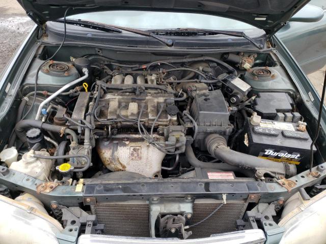 Photo 11 from auction – 1998 MAZDA 626 DX with VIN 1YVGF22C7W5713399